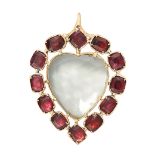 ANTIQUE ROCK CRYSTAL AND GARNET MOURNING LOCKET PENDANT, 19TH CENTURY mounted in yellow gold and