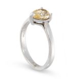 DIAMOND RING claw-set with a pear-shaped diamond of fancy greenish yellow colour, weighing