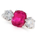 BURMA NO HEAT RUBY AND DIAMOND THREE STONE RING set with a cushion cut ruby of 2.96 carats between
