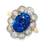 CEYLON NO HEAT SAPPHIRE AND DIAMOND RING in 18ct yellow gold, set with an oval cut blue sapphire