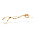 DIAMOND AND ENAMEL CHEETAH BROOCH, NAOMI SCHWARTZ in 18ct yellow gold, designed as an abstract