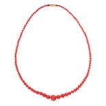 ANTIQUE CORAL BEAD NECKLACE in yellow gold, comprising a single row of one hundred and nine