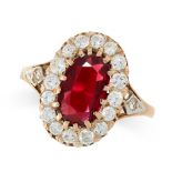 SPINEL AND DIAMOND RING mounted in yellow gold, claw set with a central oval cut red spinel of 2.