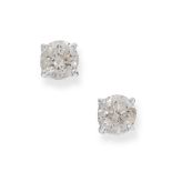 PAIR OF DIAMOND STUD EARRINGS each claw set with a circular cut diamond, both totalling 1.03 carats,