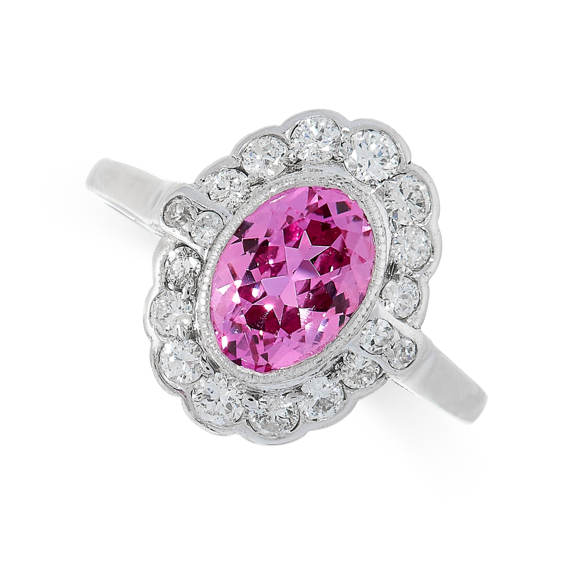 UNHEATED PINK SAPPHIRE AND DIAMOND RING set to the centre with an oval cut pink sapphire of 2.09
