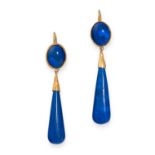 PAIR OF LAPIS LAZULI DROP EARRINGS mounted in yellow gold, each formed of a tapering polished