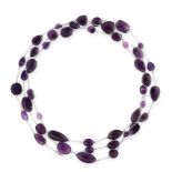 AN AMETHYST SAUTOIR NECKLACE in silver, set with oval, pear, marquise and fancy cut amethyst