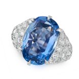 A CEYLON NO HEAT SAPPHIRE AND DIAMOND RING set with a cushion cut sapphire of 8.46 carats, between