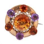 ANTIQUE VICTORIAN SCOTTISH CITRINE AND AMETHYST BROOCH in circular form, set with a central round