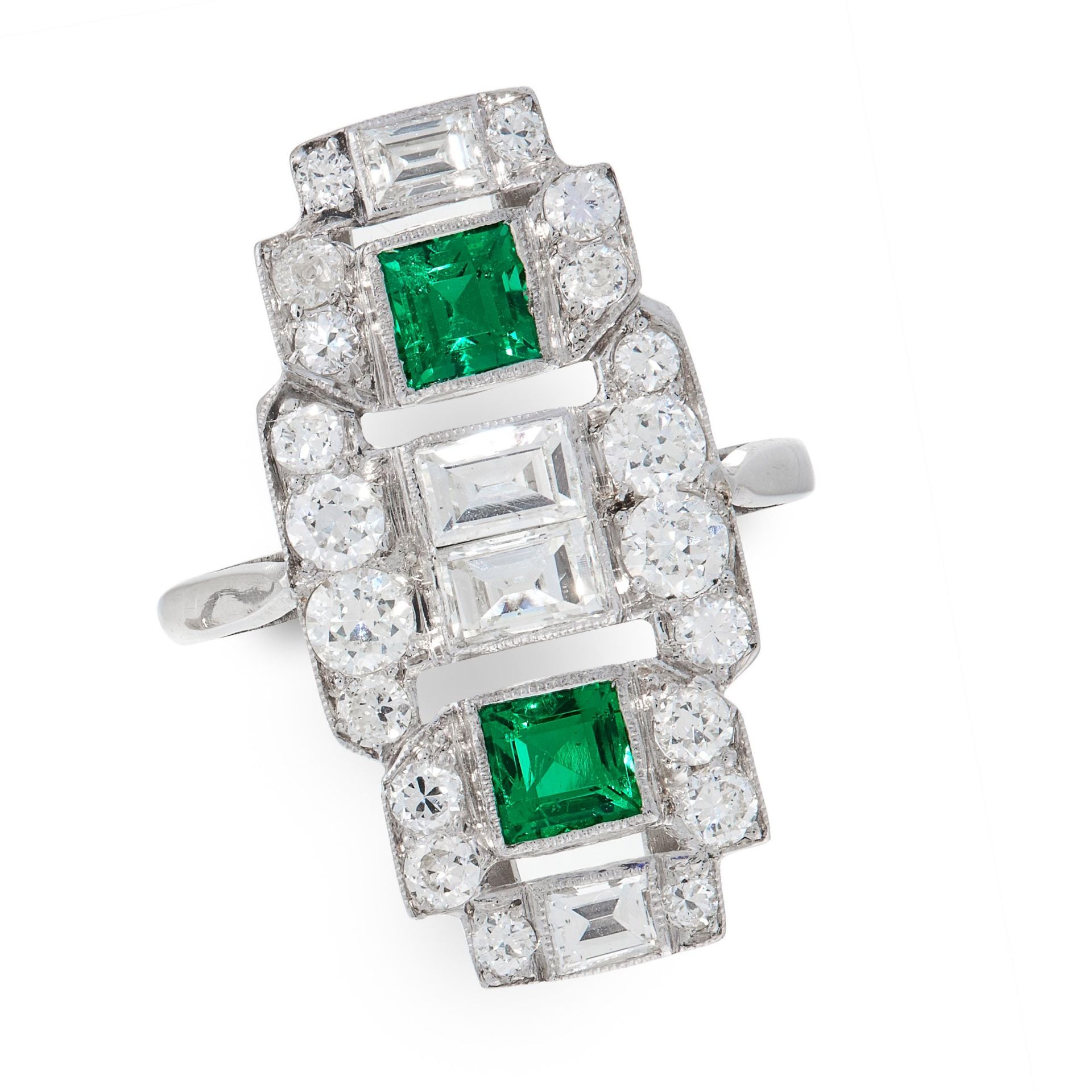 AN ART DECO EMERALD AND DIAMOND DRESS RING, CIRCA 1930 set with two square step cut emeralds and
