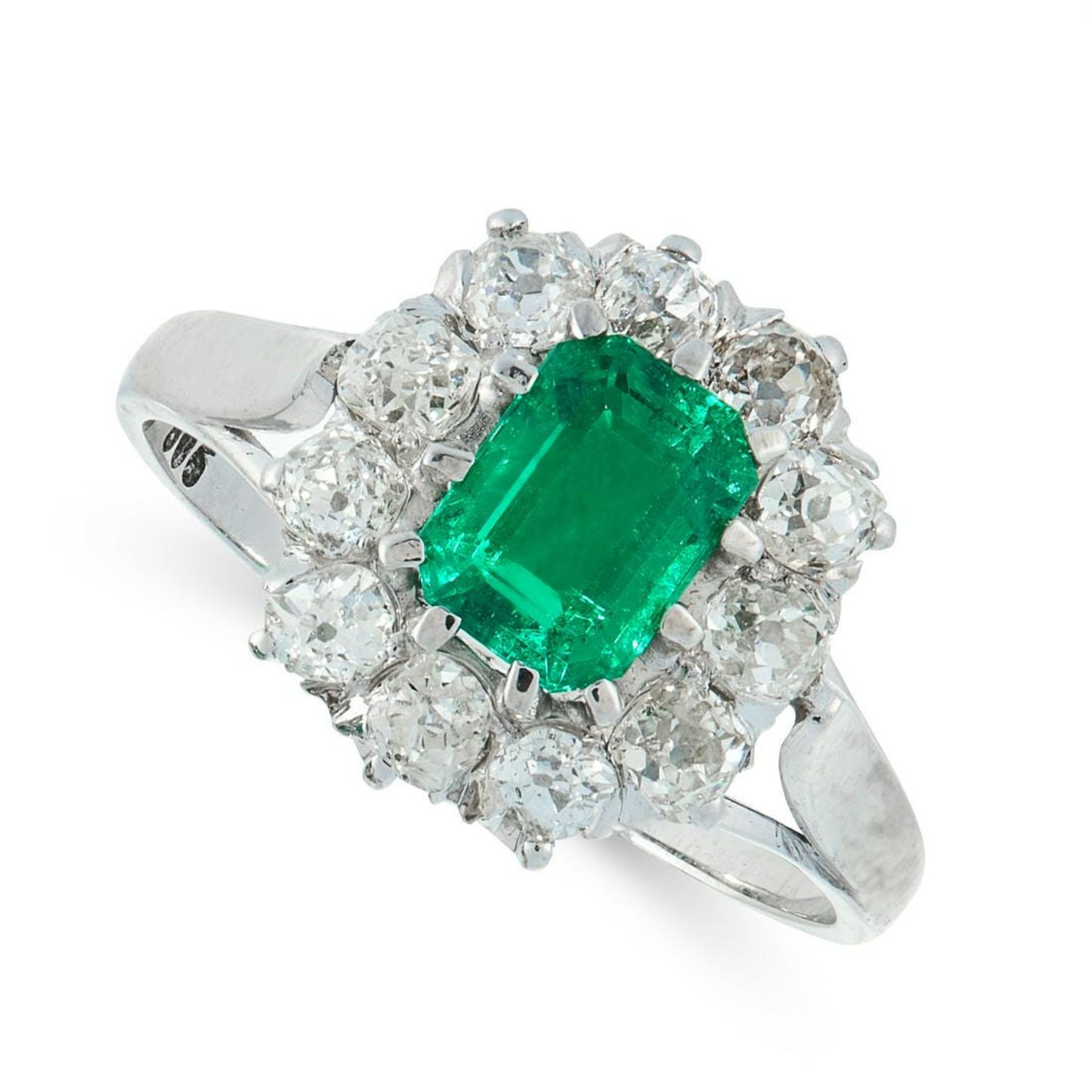 A COLOMBIAN EMERALD AND DIAMOND DRESS RING in 14ct white gold, set with an emerald cut emerald of