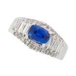 SAPPHIRE AND DIAMOND RING comprising of an oval cushion cut sapphire of 0.85 carats in a border of