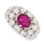 RUBY AND DIAMOND RING claw-set with an oval ruby weighing 2.40 carats, within a bombe mount set to