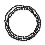 TWO JET BEAD NECKLACES comprising single rows of elongated and round faceted beads, one necklace