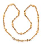 EXCEPTIONAL ANTIQUE FANCY LINK SAUTOIR NECKLACE in yellow gold, formed of a series of alternating