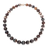 ANTIQUE BANDED AGATE BEAD NECKLACE comprising a single row of thirty-two graduated polished banded