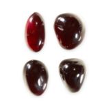 MIXED LOT OF UNMOUNTED GARNET of cabochon cut, totalling 71.42 carats.
