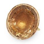 ANTIQUE CITRINE INTAGLIO SEAL RING in yellow gold, set with a faceted oval citrine, reverse carved