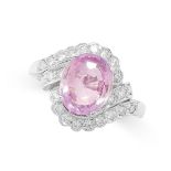 PINK SAPPHIRE AND DIAMOND RING set with an oval cut pink sapphire of 2.40 carats in a scrolling