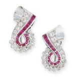 PAIR OF RUBY AND DIAMOND CLIP EARRINGS in scrolling motif, set with step cut rubies and round cut