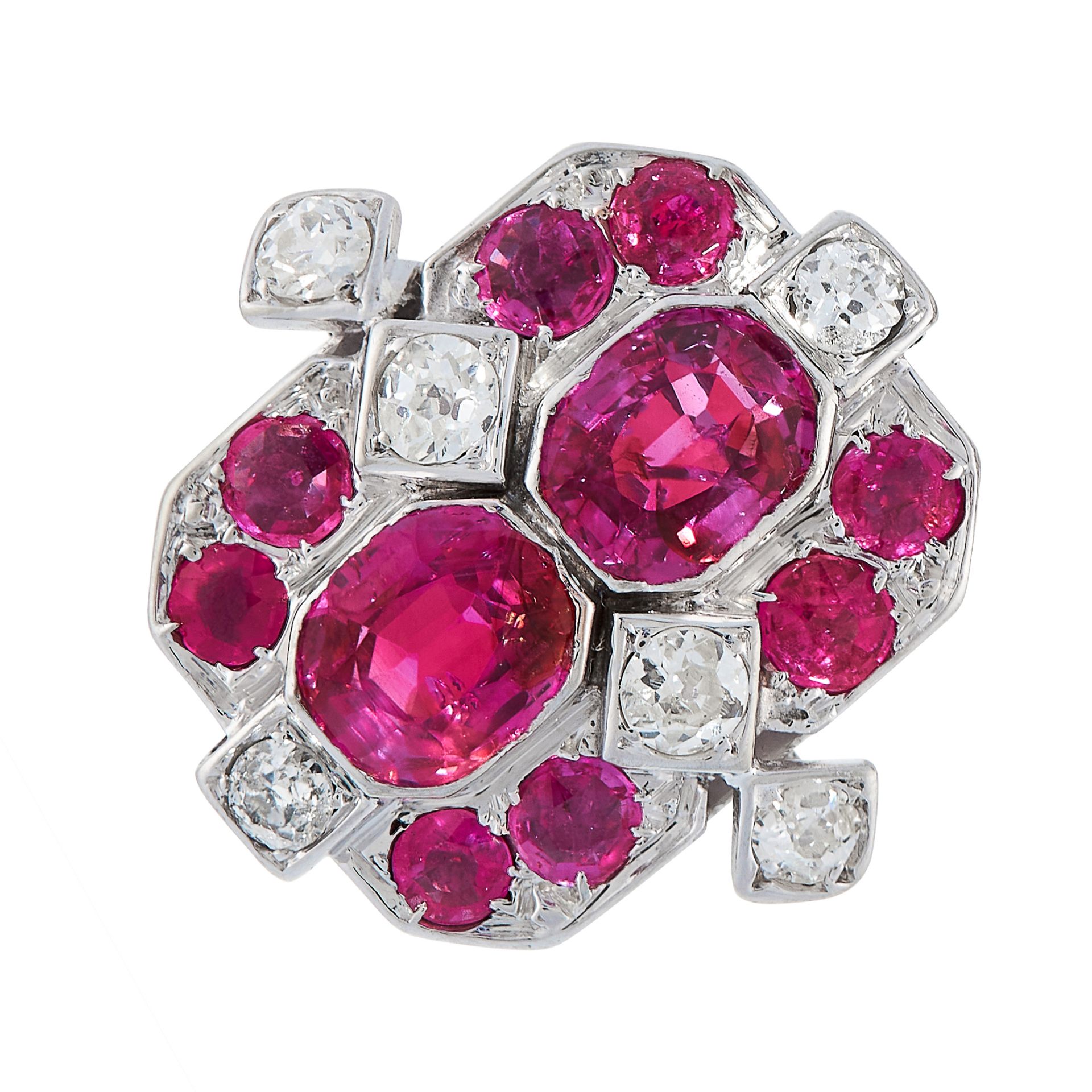 BURMA NO HEAT RUBY AND DIAMOND RING comprising of two central oval cut rubies in a border of eight