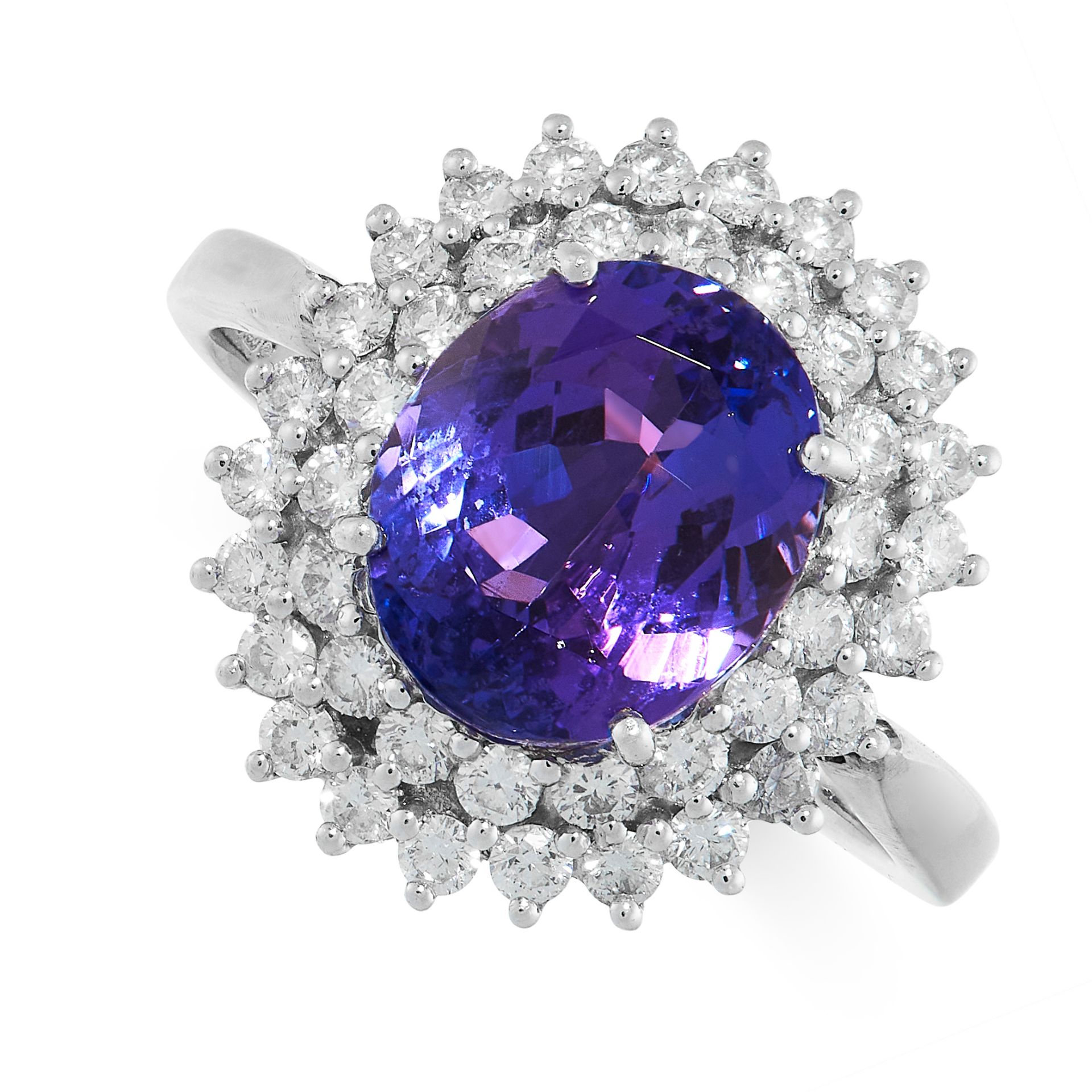 TANZANITE AND DIAMOND CLUSTER RING set with an oval cut tanzanite of 5.60 carats in a double border - Image 2 of 3
