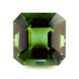 EXCEPTIONAL UNMOUNTED GREEN TOURMALINE of cut cornered step cut, weighing 73.90 carats, 24.4mm