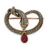 ANTIQUE GARNET AND ENAMEL SNAKE BROOCH in yellow gold, designed as a snake coiled around on