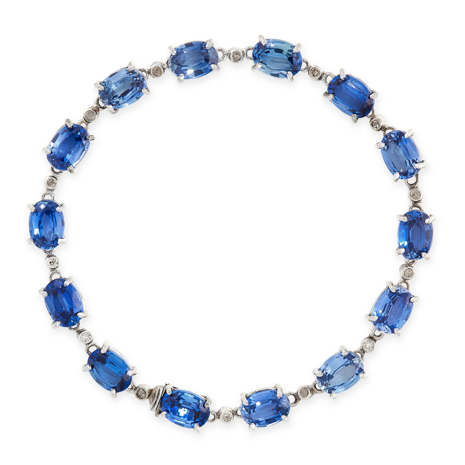 SAPPHIRE AND DIAMOND LINE BRACELET comprising a single row of fourteen oval cut blue sapphires,