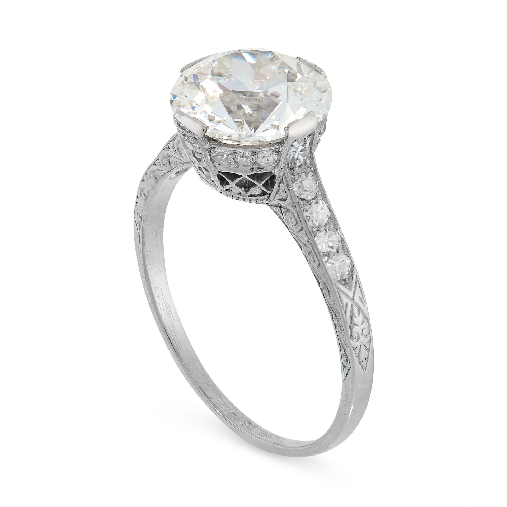 A SOLITAIRE DIAMOND RING set with an old European cut diamond of 3.09 carats, with further single - Image 2 of 2