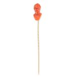 ANTIQUE CORAL TIE / STICK PIN, 19TH CENTURY mounted in yellow gold, the pin terminated with a
