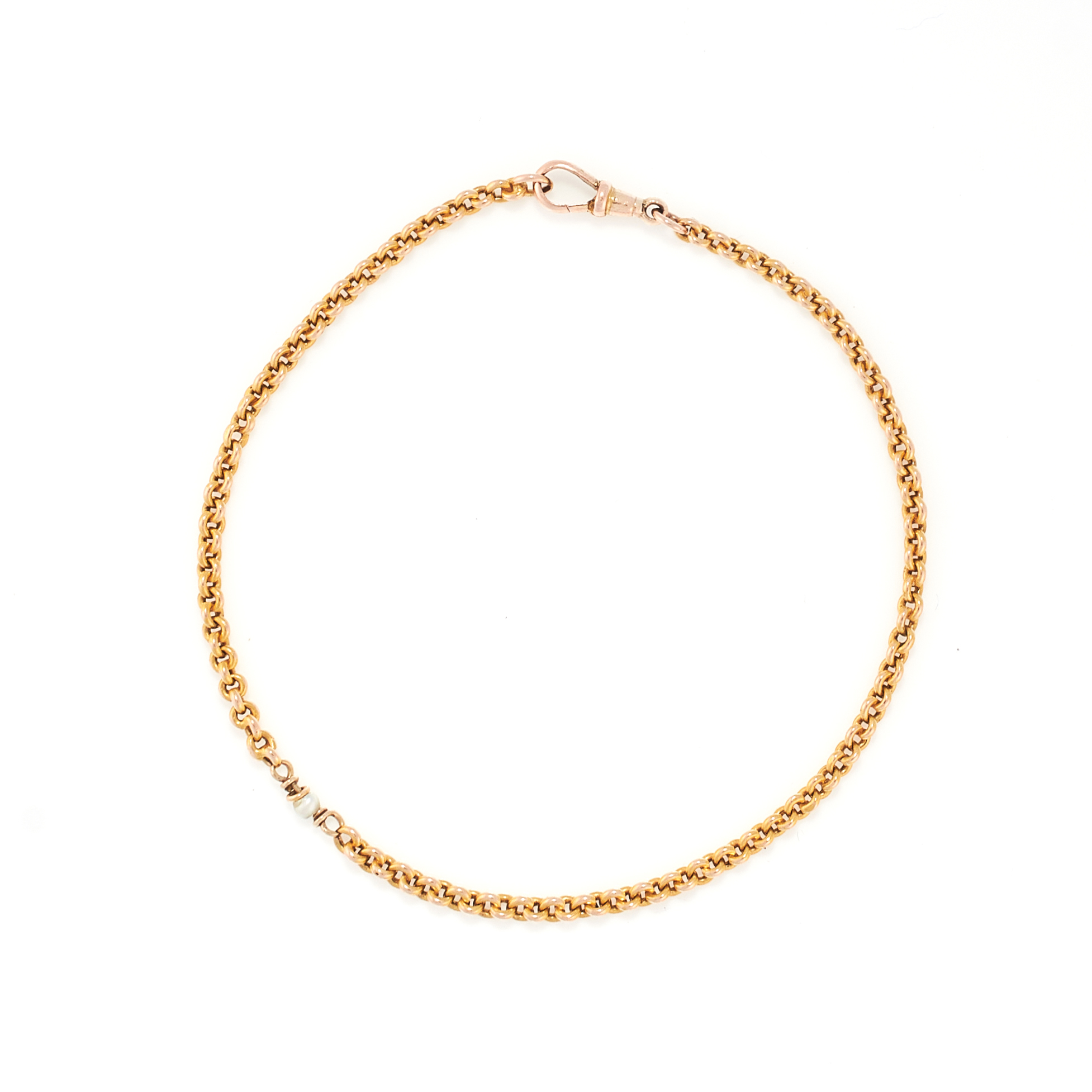 A PEARL BRACELET in yellow gold, comprising a row of belcher links, set with a single pearl,