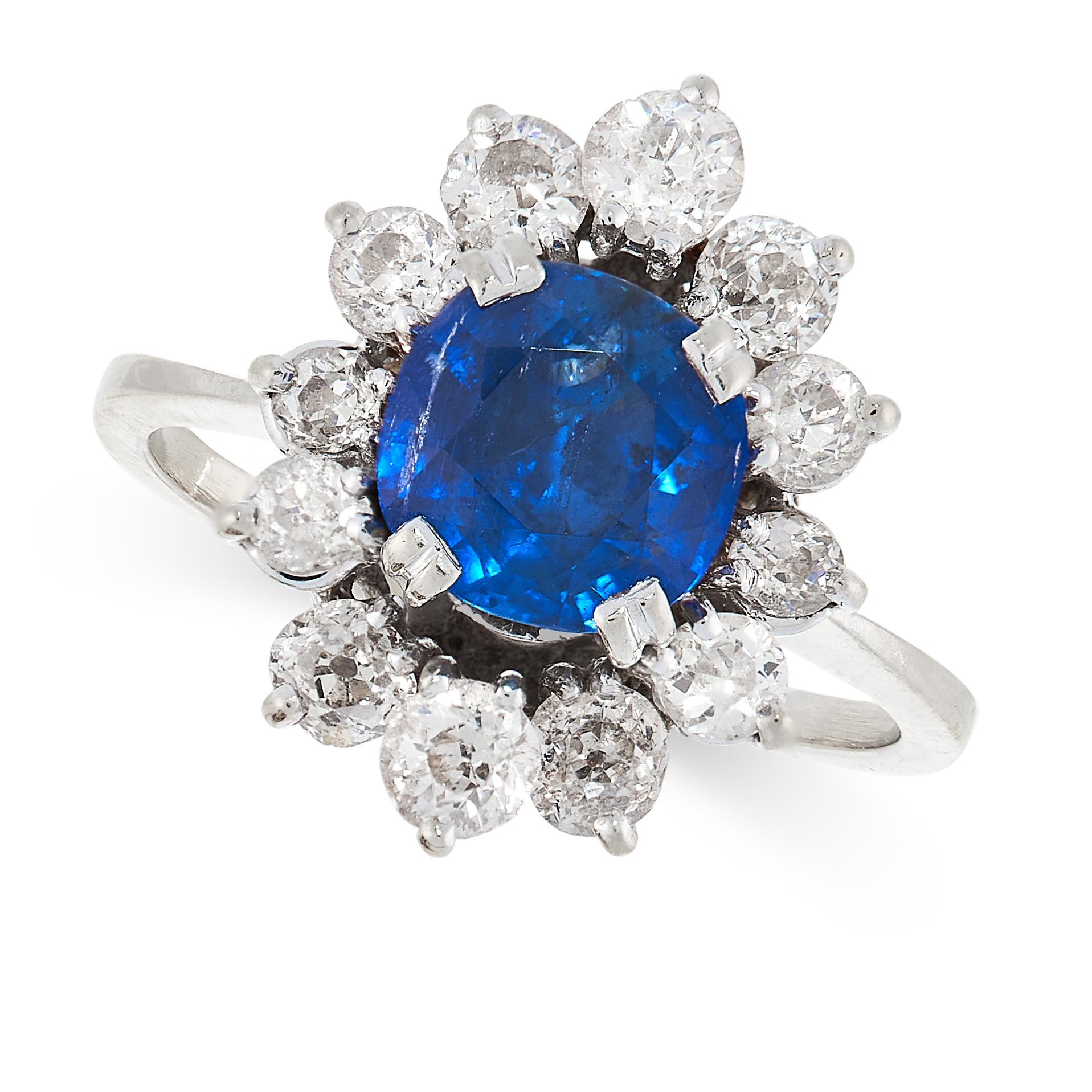 UNHEATED SAPPHIRE AND DIAMOND RING of cluster design, set with a square cushion cut sapphire of 2.01