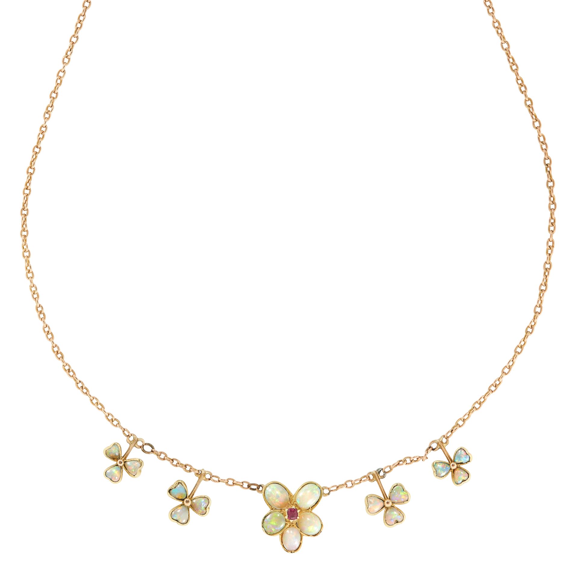 OPAL AND RUBY NECKLACE, EARLY 20TH CENTURY set with a cluster of five cabochon opals in the form