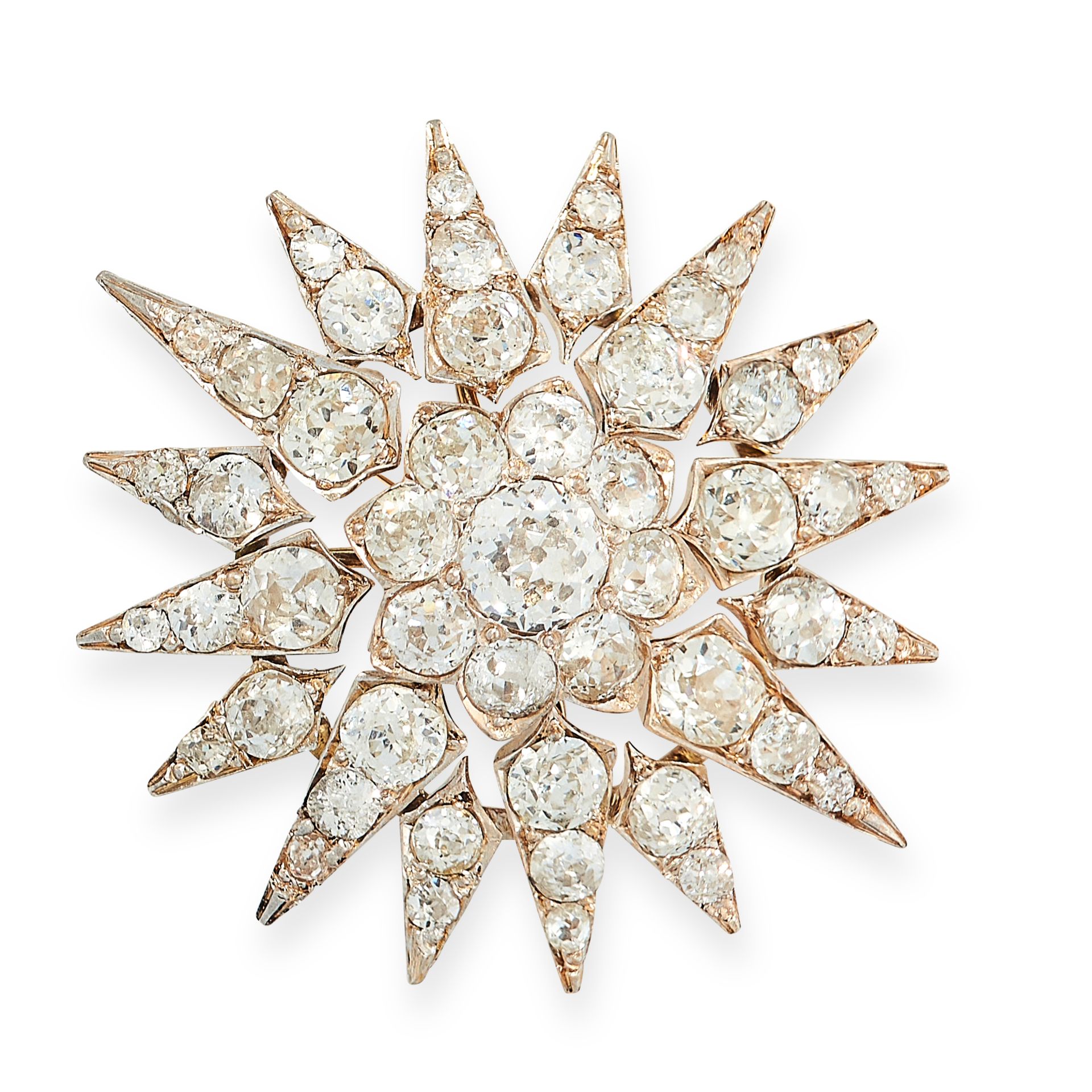 ANTIQUE DIAMOND STAR BROOCH, 19TH CENTURY in yellow gold and silver, in the form of a star burst set