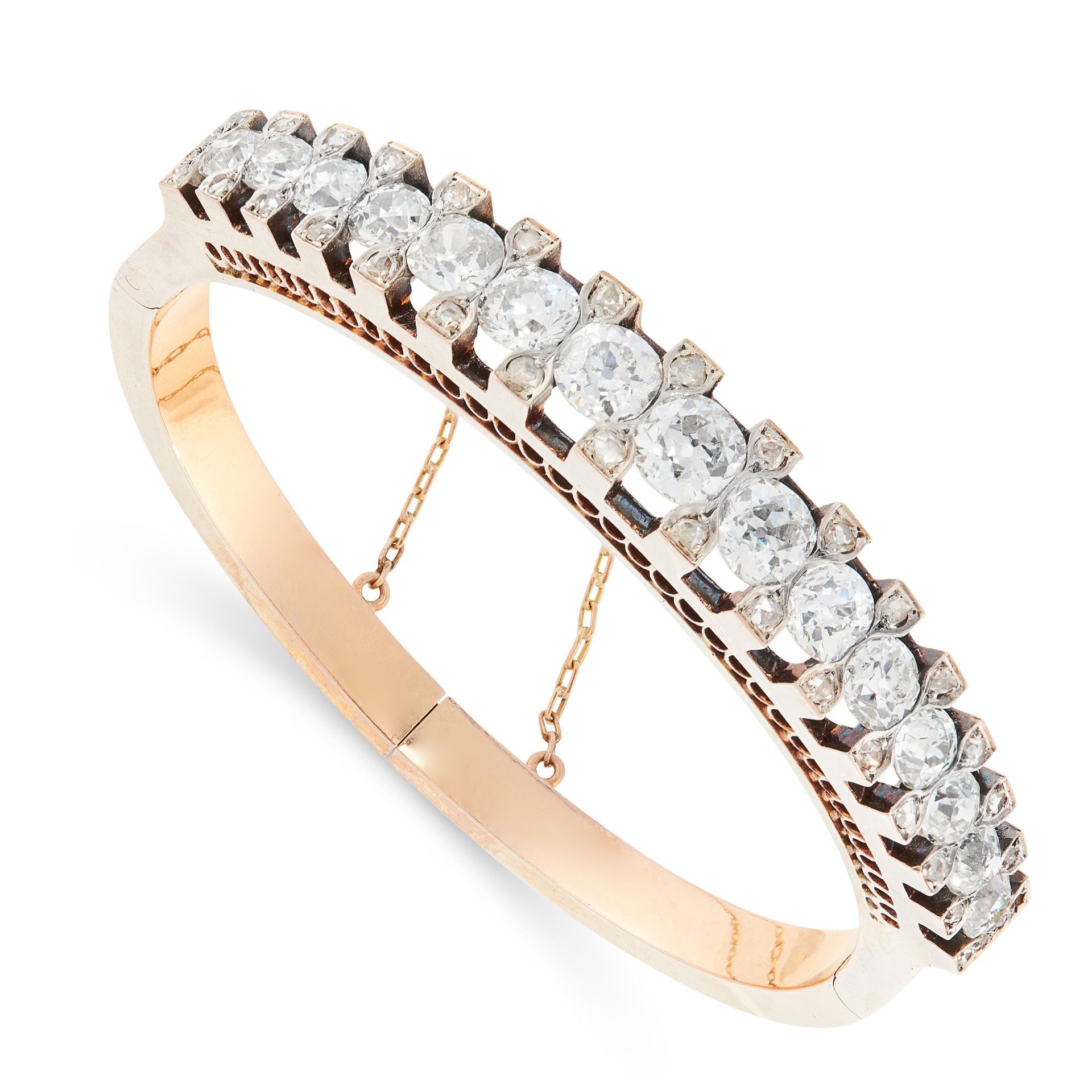 ANTIQUE DIAMOND BANGLE, 19TH CENTURY in 18ct yellow gold, comprising a single row of graduated old