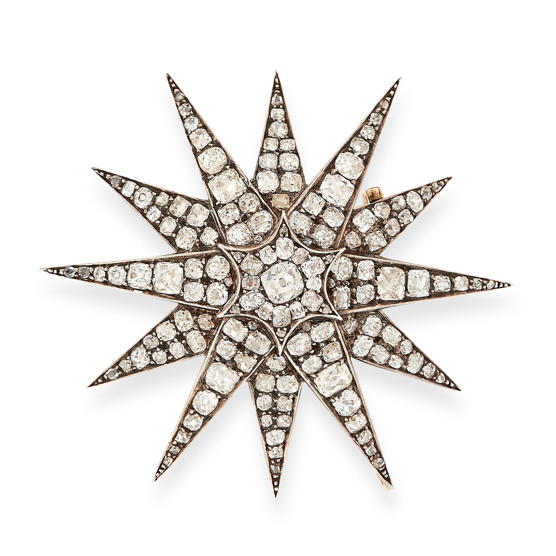 ANTIQUE DIAMOND STAR BROOCH / PENDANT, 19TH CENTURY in yellow gold and silver, designed as a star