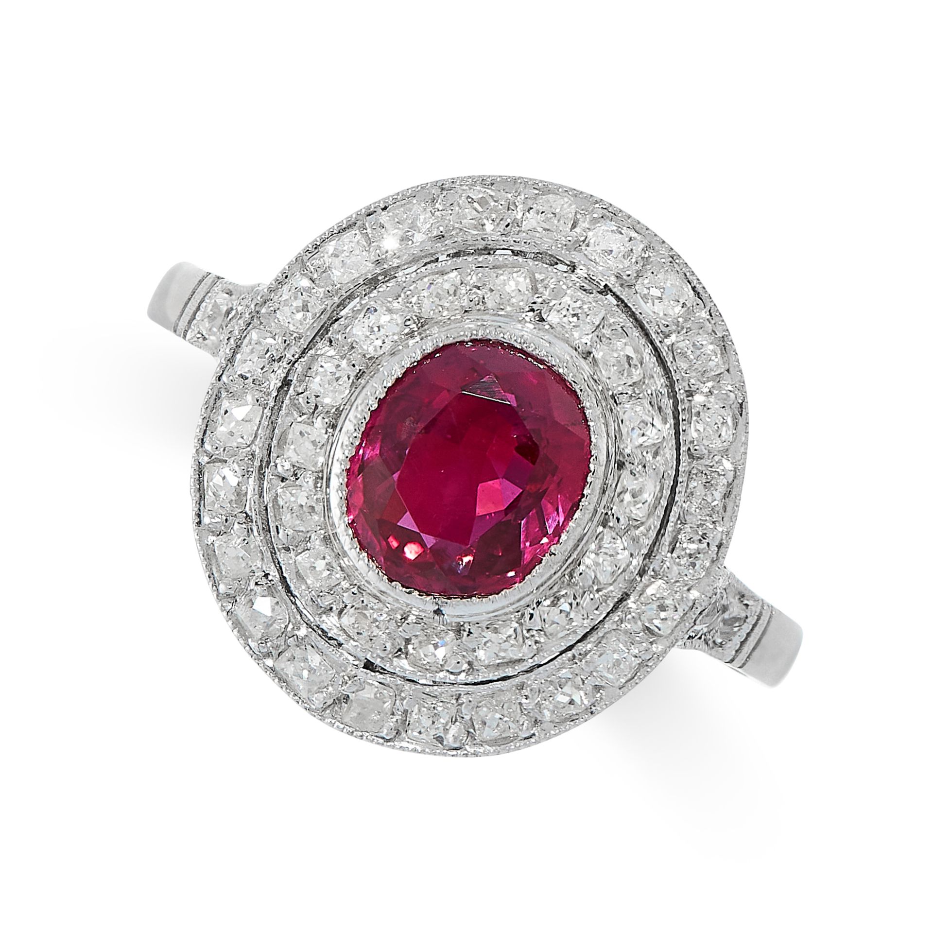 RUBY AND DIAMOND DRESS RING in platinum, set with an oval cut ruby of 1.23 carats within a border - Image 2 of 2