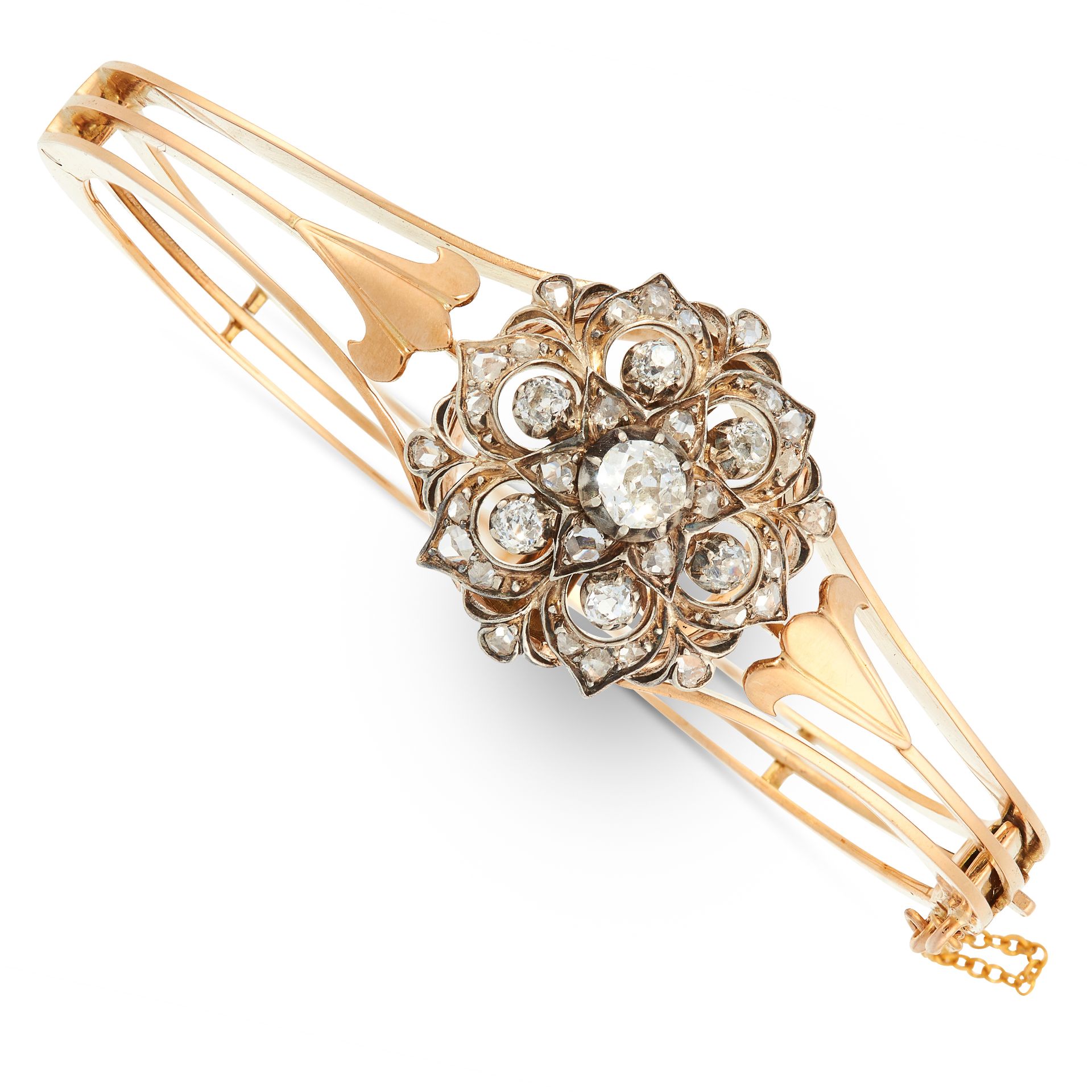 ANTIQUE DIAMOND BANGLE, LATE 19TH CENTURY in high carat yellow gold and silver, the face designed as