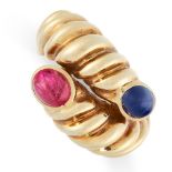 VINTAGE RUBY AND SAPPHIRE RING formed of an overlapping band with reeded decoration, set at either
