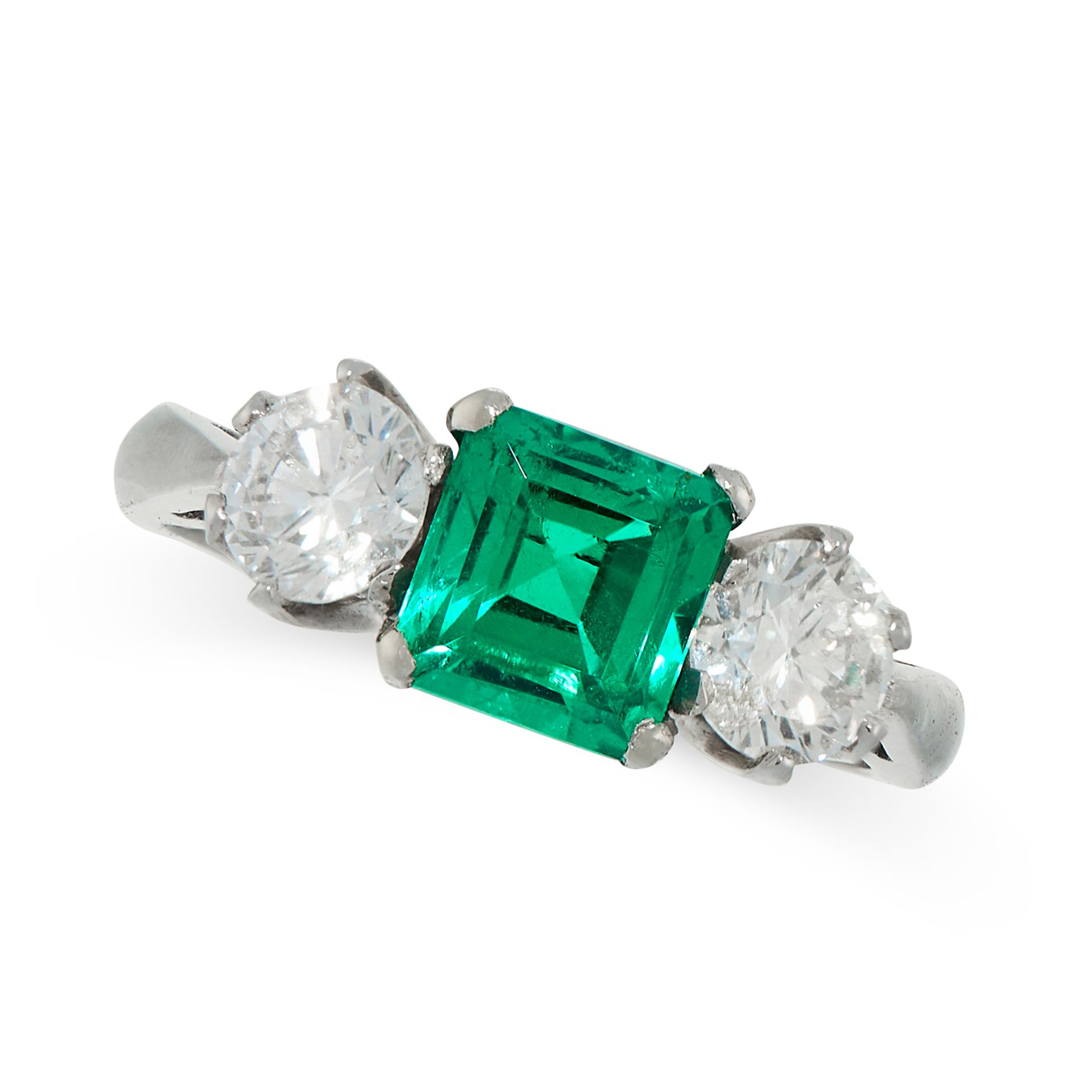 COLOMBIAN EMERALD AND DIAMOND DRESS RING in platinum, set with an emerald cut emerald of 1.33