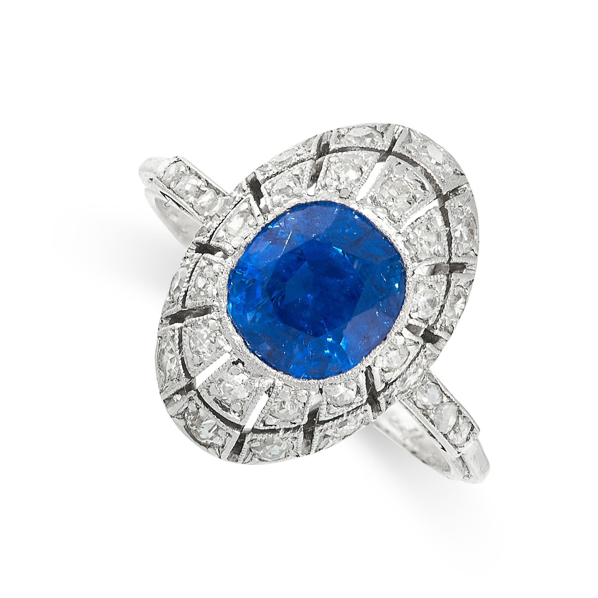 ART DECO CEYLON NO HEAT SAPPHIRE AND DIAMOND RING, 1933 the oval face set with a cushion cut blue