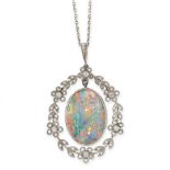 BLACK OPAL AND DIAMOND PENDANT in yellow gold and silver, set with an oval cabochon black opal of