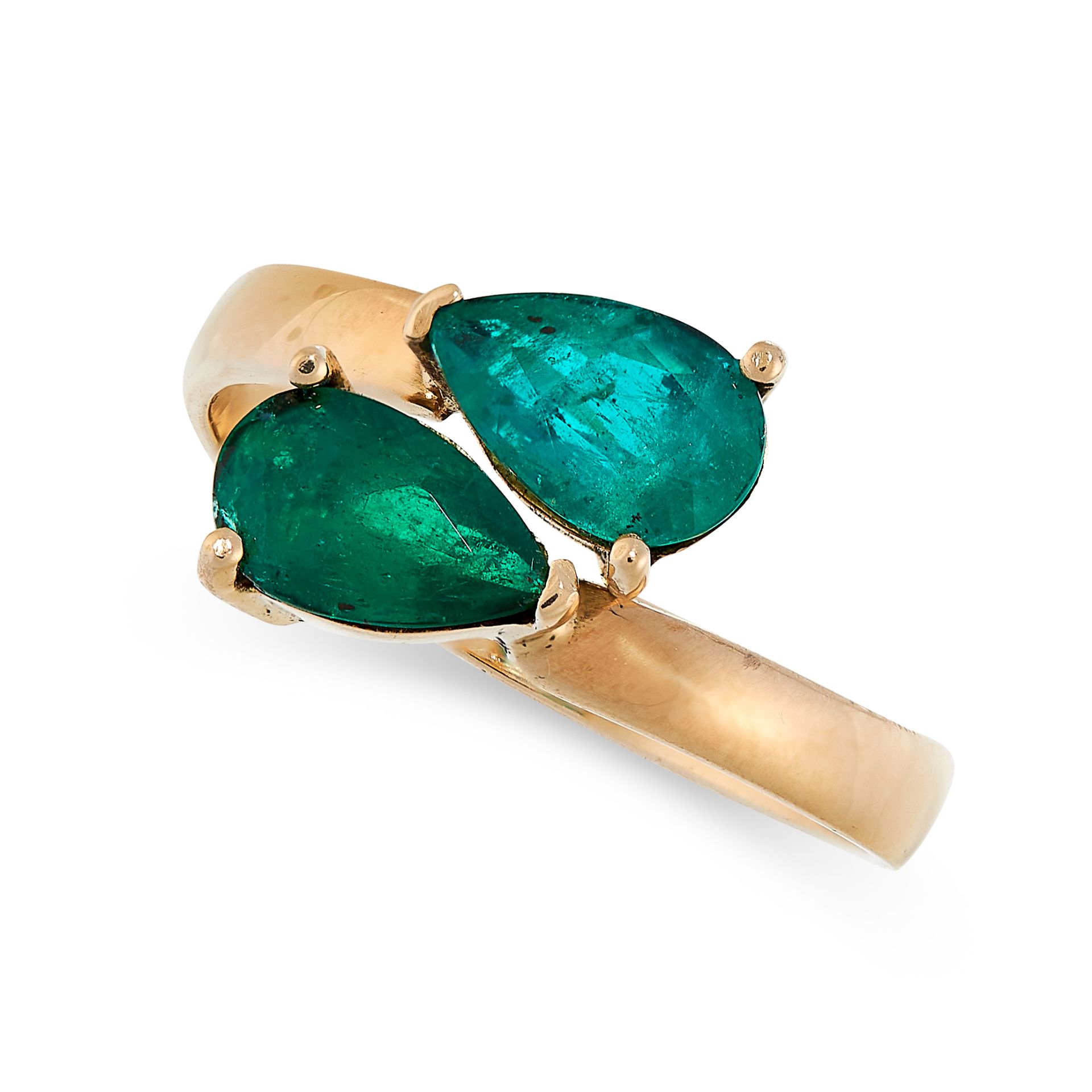 EMERALD TOI ET MOI RING the twisted band set with two pear cut emeralds of 0.71 and 0.67 carats,