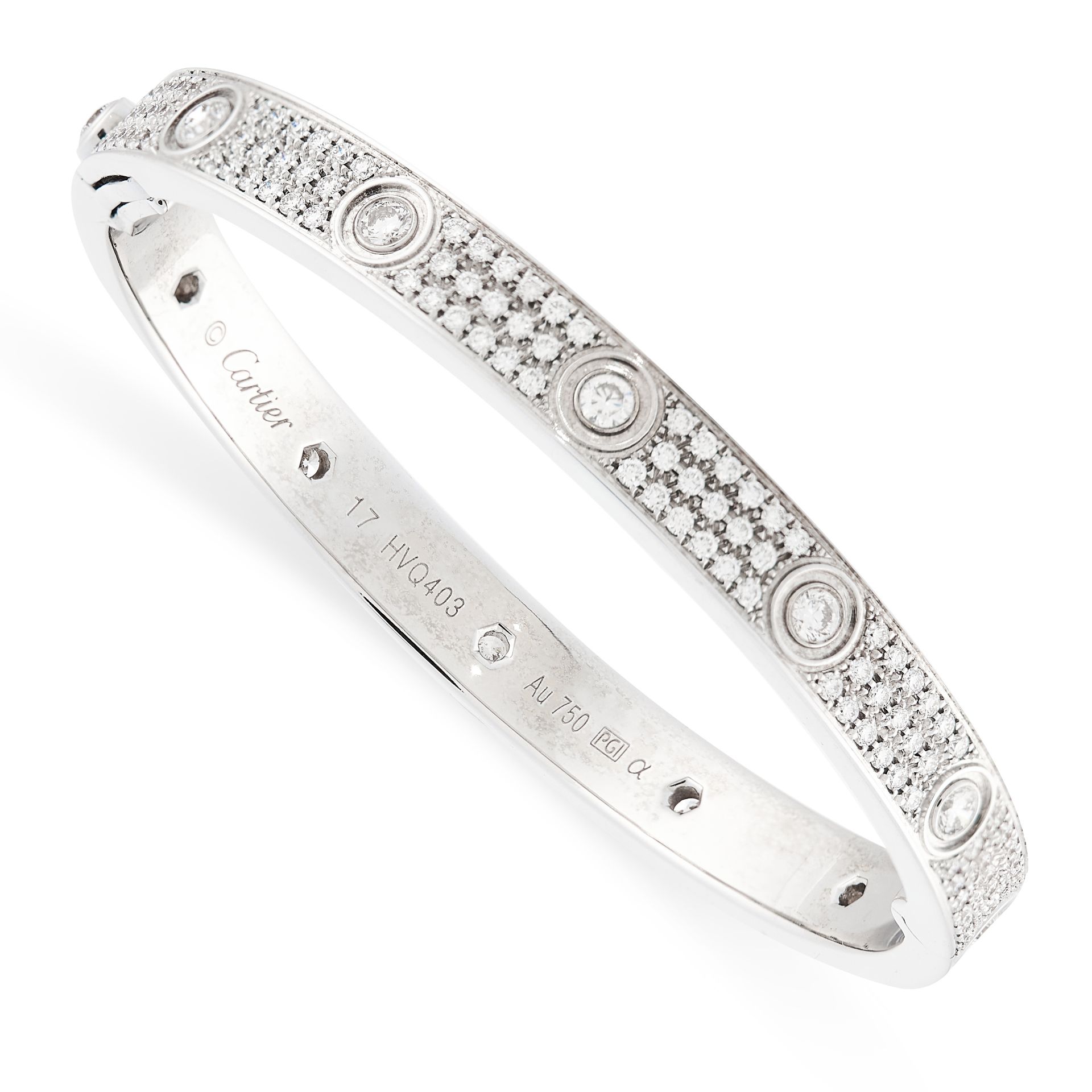 A DIAMOND LOVE BANGLE, CARTIER in 18ct white gold, the hinged bangle set with twelve round cut