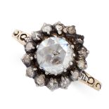 ANTIQUE DIAMOND RING in yellow gold and silver, set with a rose cut diamond of 7.3mm in a border