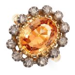 ANTIQUE IMPERIAL TOPAZ AND DIAMOND RING in yellow gold and silver, in cluster design, set with an