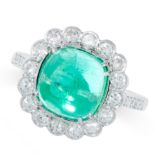 EMERALD AND DIAMOND RING in 18ct white gold, set with a cushion shaped cabochon emerald of 4.66