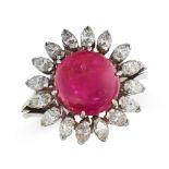 BURMA NO HEAT RUBY AND DIAMOND CLUSTER RING comprising of a cabochon ruby of 7.26 carats in a border