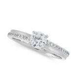 SOLITAIRE DIAMOND RING in platinum, claw set with round cut diamond of 0.56 carats, with rows of